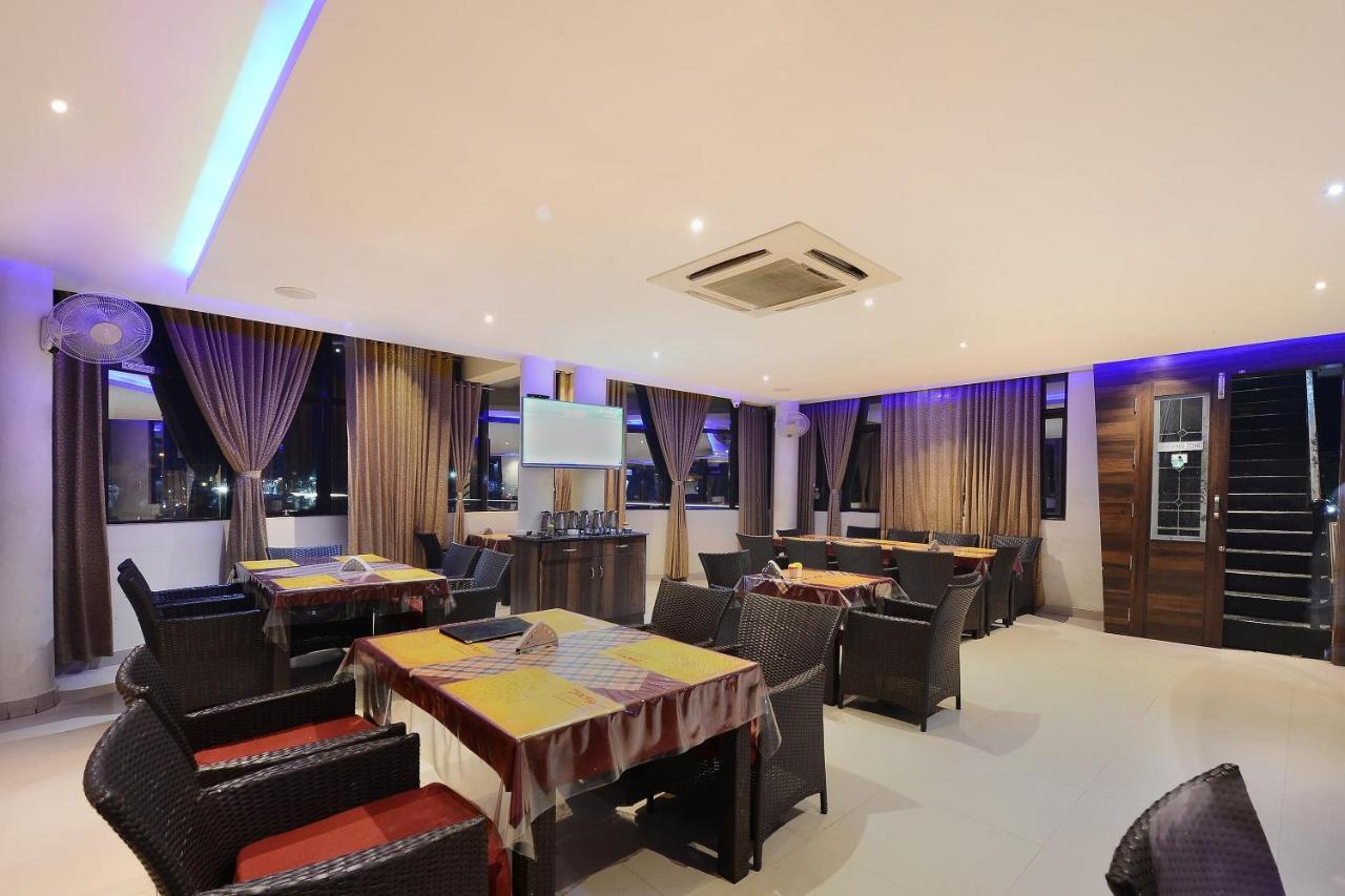 Capital O Hotel Samanvi International Belur  Bagian luar foto