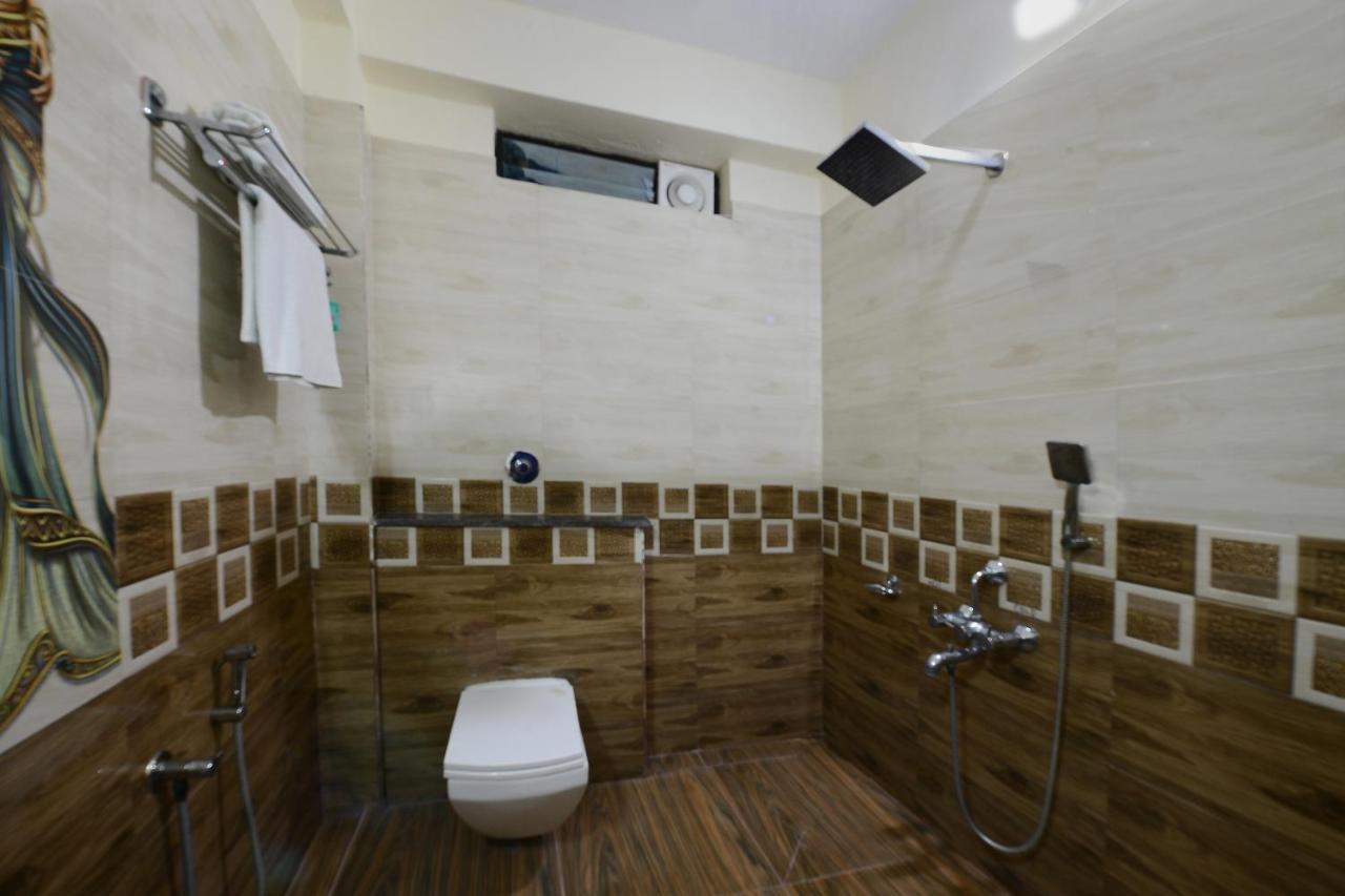 Capital O Hotel Samanvi International Belur  Bagian luar foto